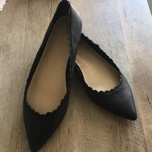Pointy black flats